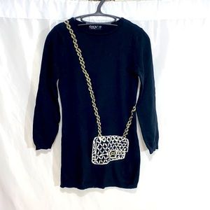 Black long-sleeve sweater dress with sewn in purse image.